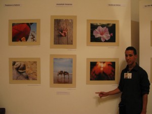 Abdallah showing his pictures