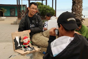 Ksanier being assisted by volunteer Jie during the photoshoot