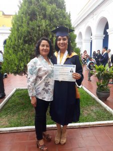 Yuli next to her very proud mother